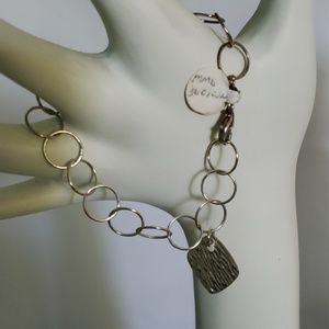Sterling Silver Rolo bracelet with tag.